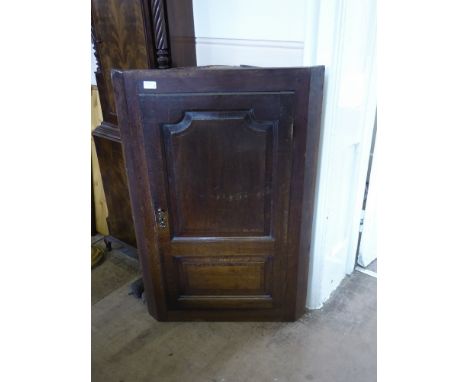 A  Oak Corner Cupboard with three shelf areas and two inner drawers to base, approx 33 x 68 x 102 cms.