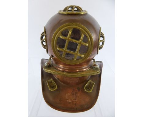 A Miniature Brass/Copper Deep Sea Diver's Helmet.