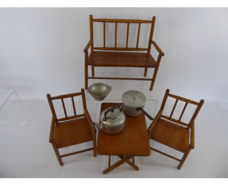 A Quantity of Miniature Wooden Furniture, including two chairs, a table and a bench, together with miniature tin kitchen impl