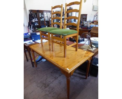 Six Pine Ladder-Back Kitchen Chairs, together with a rectangular pine kitchen table, approx 154 x 84 x 76 cms