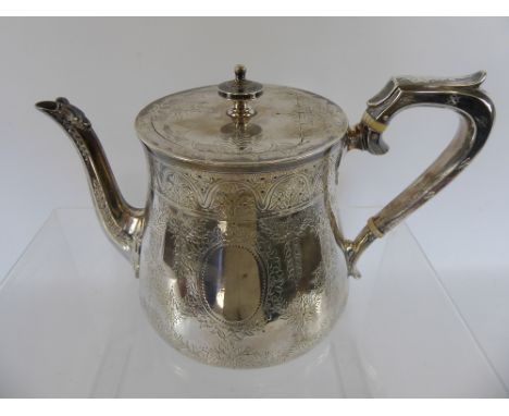 A Victorian Silver Tea Pot, London hallmark, mm Edward Hutton dated 1880, approx 520 gms