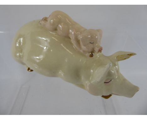 A Beswick Sow and Piglet, approx 17 cms. (af)