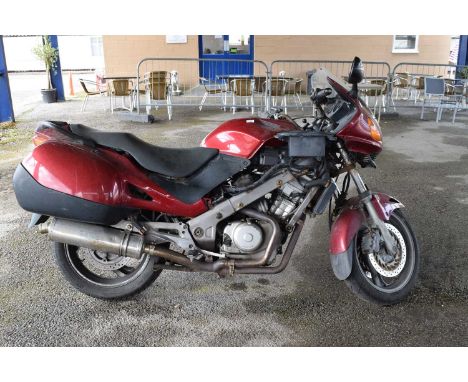 A Honda 650 motorbike, registration number YP53 APK, as removed from clearance, sold without any guarantee, key present and a