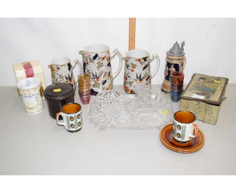 Mixed Lot: Graduated set of floral pattern jugs, glass dressing table set, beer stein, bakelite tobacco jar etc