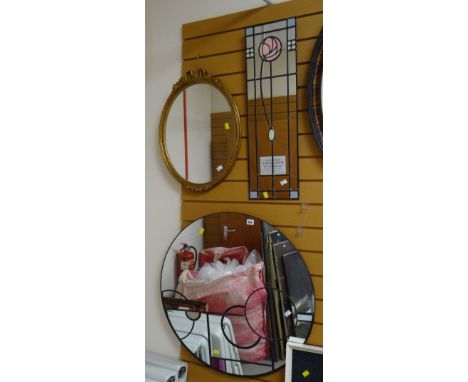 Two modern Mackintosh-style wall mirrors together with an oval gilt framed mirror