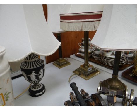 A pair of brass effect table lamps & another, a good Wedgwood Jasperware classical decorated table lamp (all with shades)
