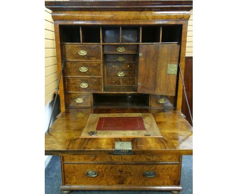 Late seventeenth / early eighteenth century burr walnut secretaire cabinet on chest, the blind panelled front revealing fitte