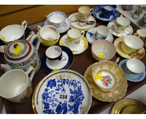 A tray of various china cups & saucers, coffee cans etc