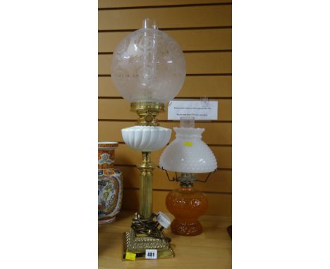 A brass Corinthian columned oil lamp converted to electric together with another