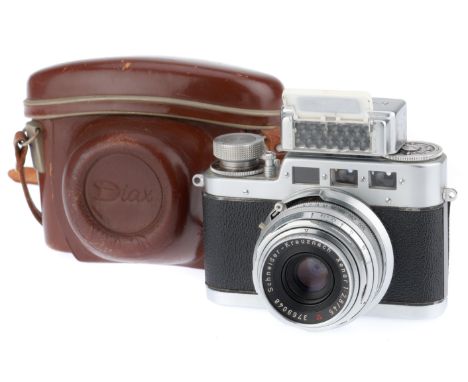 silver, serial number 62826, body G-VG, shutter working, sticky at slow speeds, with a Schneider-Kreuznach f/2.8 45mm lens, o