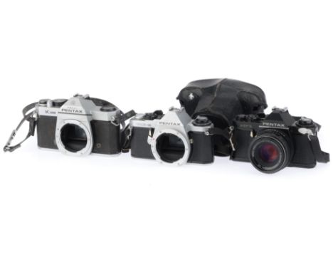 comprising an MV, black, body G, shutter works, with a Pentax-M f/2 50mm lens, barrel G, optics G with light haze, with case,