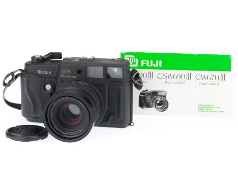 black, body VG, shutter works, rangefinder works, optics F-G with light haze, with cap and guide book.