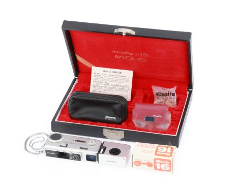 comprising the Minolta MG-S, silver, body G, shutter working, with flashcube holder, roll of sealed expired film, soft case, 