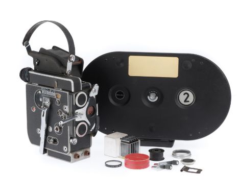black, body F-G, shutter control jammed, doesn't run, for spares or repair,  comes with a 400 foot film magazine and some sma