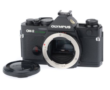 black, serial number 1122652, body F, has a metal ID plate glued to back, powers up, meter responds, shutter not firing.