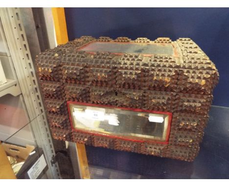 A vintage American tramp art box with hob-nail carving and bevelled mirror panels to top and sides (A/F)