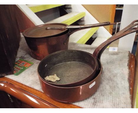 Three vintage copper saucepans and one lid