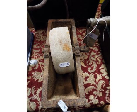 A vintage knife sharpener and two lump hammers