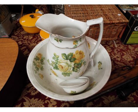 A Pountney & Co Bristol wash basin, water jug and soap dish decorated with yellow roses 