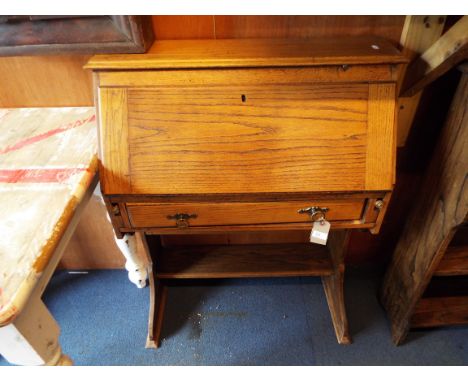 A light oak student's bureau