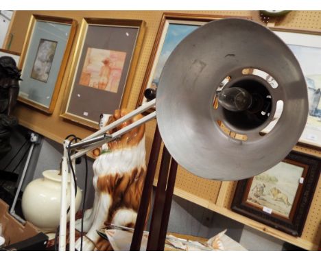 An angle poise lamp