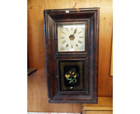 A 19thC mahogany cased American wall clock, the dial inscribed 'J.S. Arthurs, East Street, Dorking' above a hand painted pans