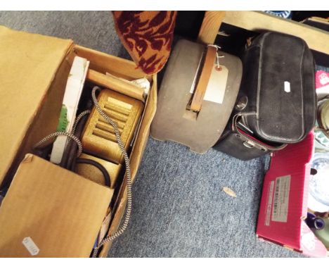 A boxed vintage 'Gnome' slide projector together with a 'Rolls' automatic cine camera etc 