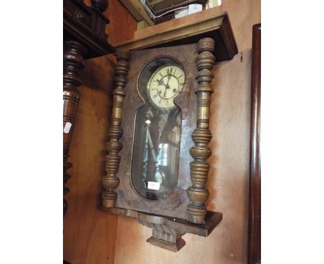 A walnut cased wall clock for restoration