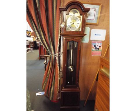 A 20thC mahogany long case Fen clock the silvered chapter ring with Roman numeral and inscribed Thomas Byrne