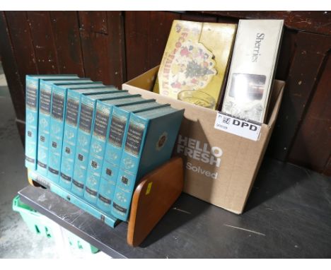 Book trough with The Modern Encyclopaedia Illustrated and box of glassware