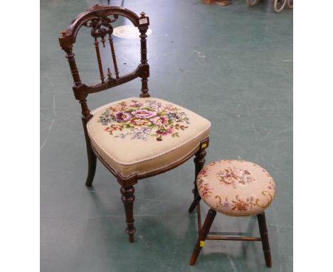 Victorian carved hall chair with tapestry stuffover seat raised on turned legs, and footstool with similar tapestry top 