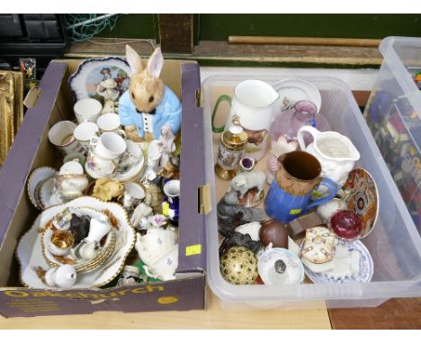 Two boxes of ornaments, jugs, cabinet cups and saucers, rabbit biscuit barrel etc