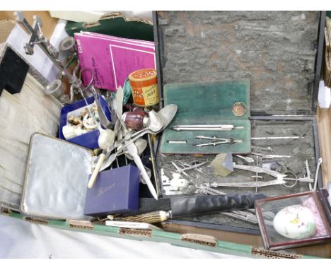 Two boxed sets of compasses, cutlery, maps, religious candlestick, tins, etc 