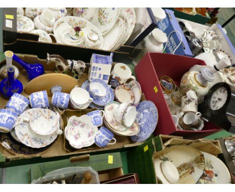 Two boxes of cups and saucers, lamp, clock, glassware, ornaments etc