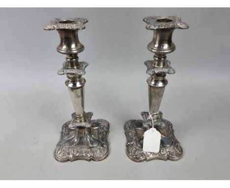 COLLECTION OF SILVER PLATE,including a pair of candlesticks, cafe au lait set, a basket, flatware, also a horn handled carvin