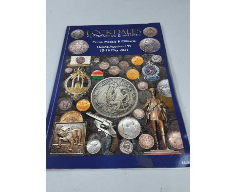 COLLECTION OF AUCTION CATALOGUES,along with a guide to German Nazi Party Awards, a book on the Emperors of Rome and a postcar