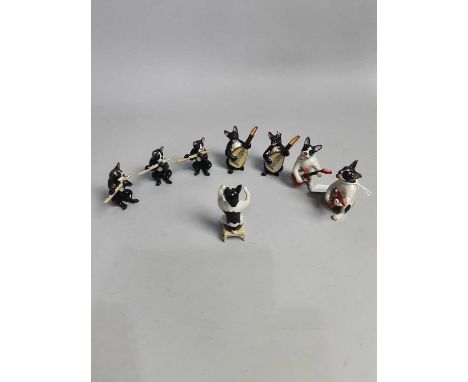 CERAMIC DOG BAND,along with a group of other ceramic animalsMixed lot. Ears chipped to some of the dogs, figures of the deer 