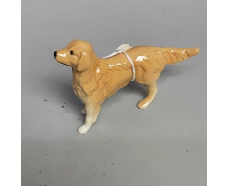 BESWICK FIGURE OF A RETREIVER,7.5cm high, 12cm wide, along with other ceramic models of dogsOverall good condition no major n