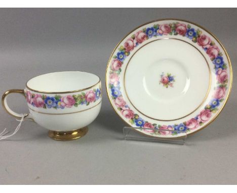 VICTORIA TEA SERVICE,with floral and gilt decoration, comprising eight tea cups, nine saucers, and ten sideplates, along with