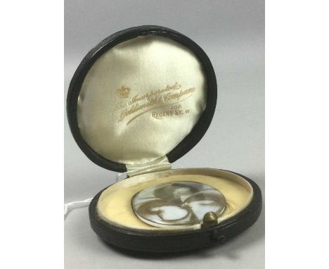 19TH CENTURY OVAL PORTRAIT MINIATURE BACK,with a display of locks of hair, 5.5cm high