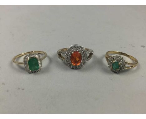 TWO NINE CARAT GOLD AND GEM SET RINGS,along with another gem set ring stamped 9K (3)