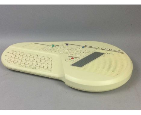 1980S OMNICHORD BY SUZUKI,cased with operation manualLacking adaptor