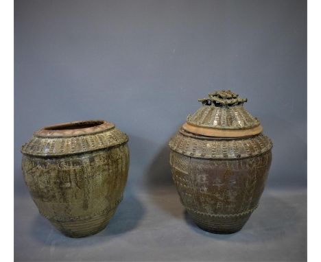 A pair of large Chinese Celadon glazed ceramic jars, 4th century 