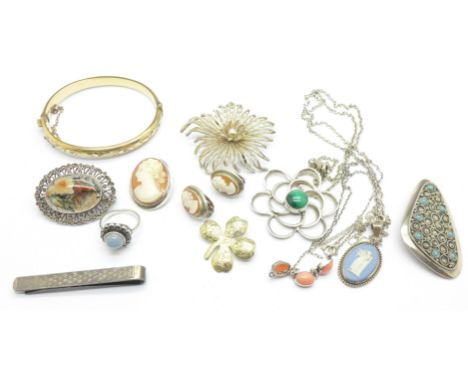 Silver jewellery including a moss agate set brooch, a moonstone and marcasite set ring, a tie-clip and a rolled gold bangle