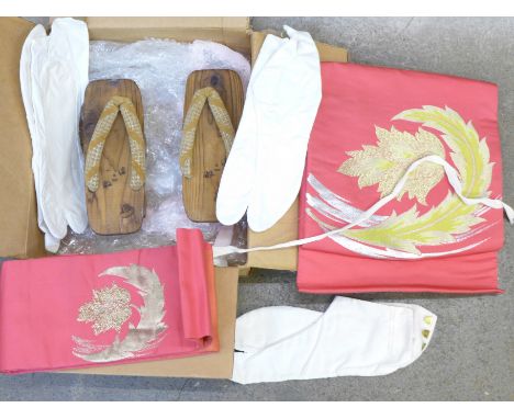 A 1950's Japanese obi sash with socks and wooden shoes