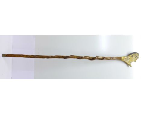 A folk art walking stick/staff