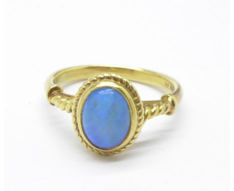 An 18ct gold and opal ring, 5.8g, R