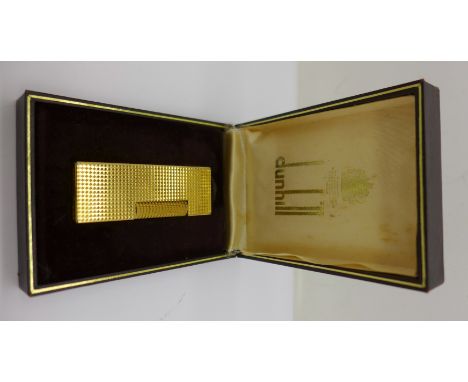 A Dunhill lighter, boxed