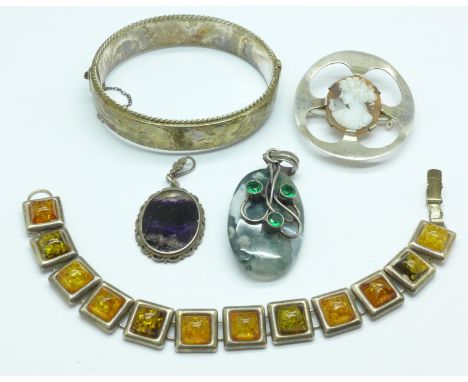 A hallmarked silver and Blue John pendant, a silver bangle, a silver bracelet and two other silver pendants