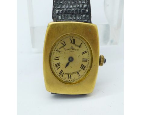 A lady's Baume &amp; Mercier wristwatch in an 18ct gold case, glass and minute hand missing